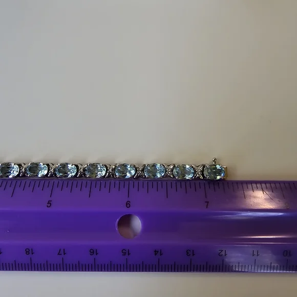 Natural Sky Blue Topaz & Diamond Accent Tennis Bracelet in Sterling Silver! - Picture 6 of 6